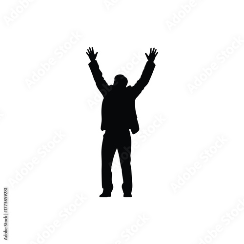 Silhouette of a person with arms raised in celebration or surrender