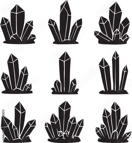 set of mystical crystal formations in crisp black silhouette against a white background.