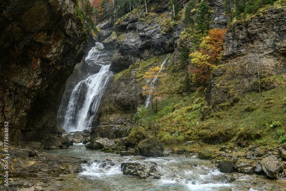 Fototapeta premium Arripas waterfall or cave waterfall, in the Ordesa and Monte Perdido National Park - Spain