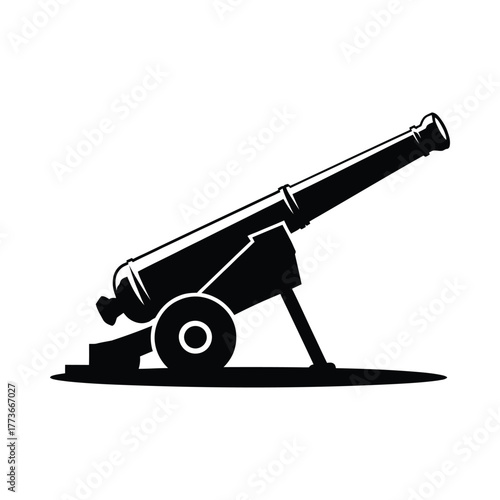 Silhouette of an antique cannon on a carriage with wheels