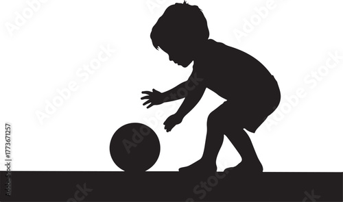 Silhouette of a young child playing with a ball on a white background