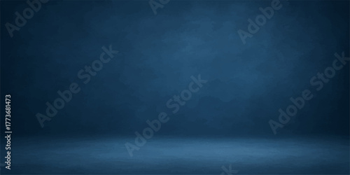 Dark blue grunge wall texture background with a blank vintage chalkboard surface