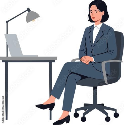 A businesswoman sits at a desk with a laptop and lamp on a plain background.