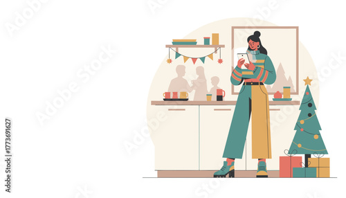 A woman uses a tablet in a cozy modern kitchen decorated for Christmas holidays and family celebration