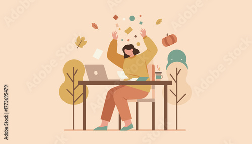 Woman celebrates digital work achievement in a cozy autumn outdoor setting
