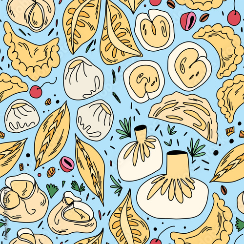 A delicious assortment of dumplings, vareniki and manti on light blue surface among herbs and spices