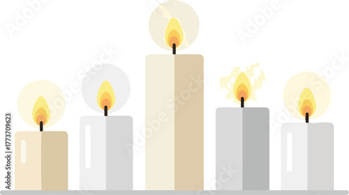 Five lit candles of varying heights and colors on a white surface.