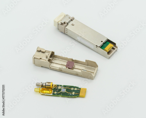 Small Form-factor Pluggable SFP nework module disassambled.