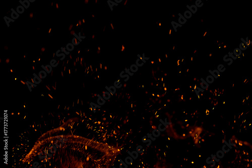 A black background with a lot of fire and smoke