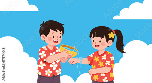 Happy children in colorful floral shirts celebrating Songkran festival by pouring water on each other's hands in a bright blue sky with clouds.