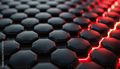 Dark hexagonal geometric shapes form an intricate pattern, with a vibrant red light glowing from beneath, offering an excellent abstract background wallpaper.