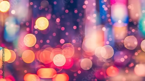 Vibrant and colorful bokeh lights abstract background, sparkling defocused festive illumination, dreamy urban night scene with blurred reflections.