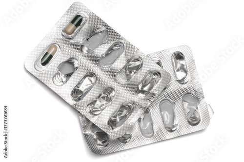Used blister pack of ten pills on a white background
