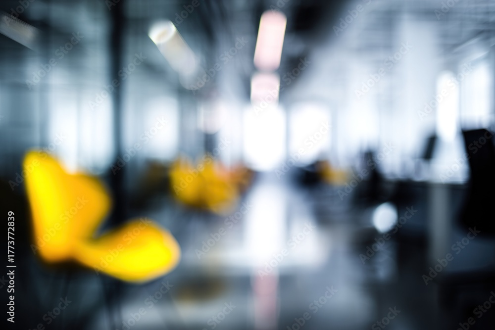 custom made wallpaper toronto digitalA blurred image featuring bright yellow chairs in a modern, spacious environment, conveying a sense of contemporary design.