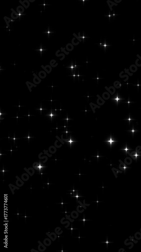 Seamless loop video of Sparkling fantasy particle background (white) [vertical video]