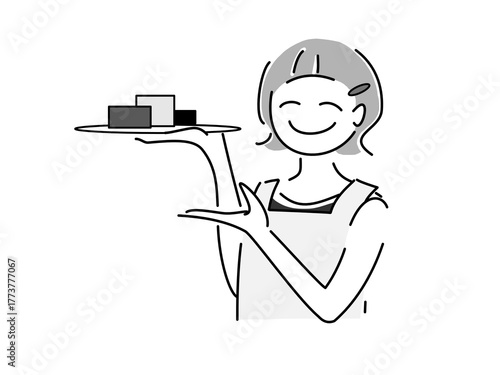 商品を紹介している女性の店員さん
