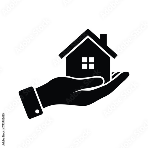 Black silhouette of a hand holding a house
