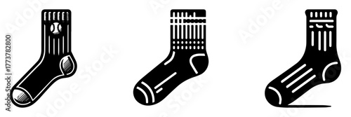 Socks in a row black and white illustration three different designs.