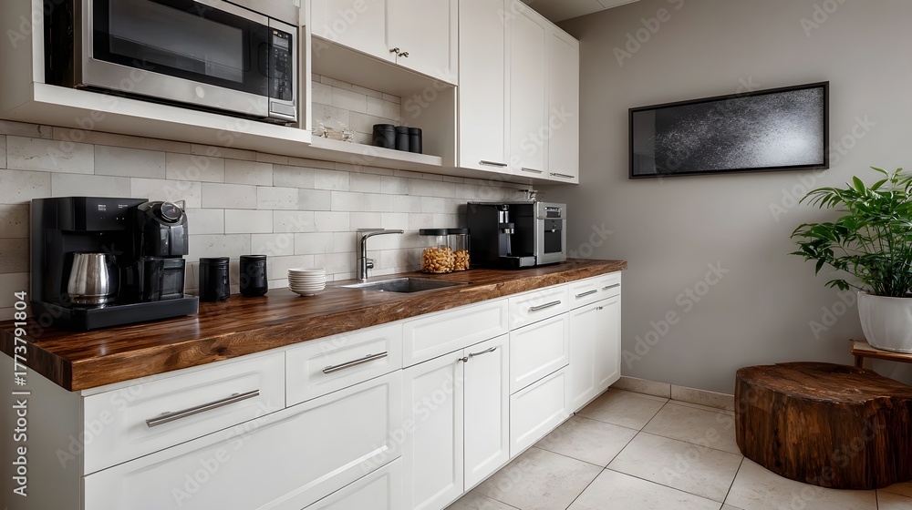 Fototapeta premium Modern office breakroom with white cabinets wooden countertop and coffee amenities