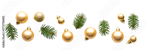 Festive golden christmas ornaments and green fir branches arrangement
