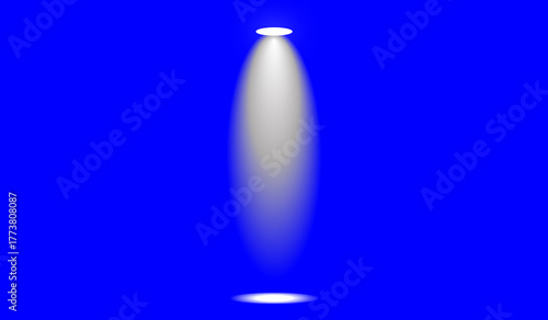 A bright white spotlight beam illuminates the darkness against a vibrant electric blue background
