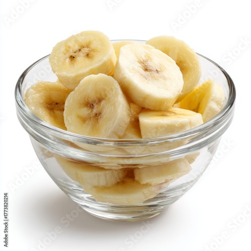 Sliced bananas in a clear glass bowl, ready for enjoyment. A healthy and delicious treat that can be enjoyed any time