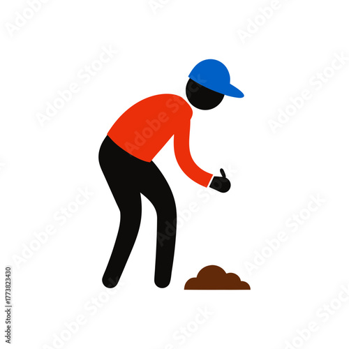 Gardener in blue cap and orange shirt digging in soil