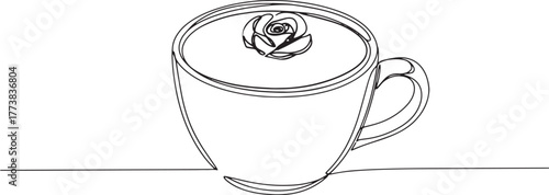 Elegant single line drawing of rose latte art in a white ceramic
