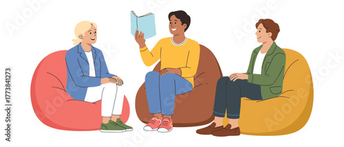 Diverse group of friends reading together on bean bag chairs happily