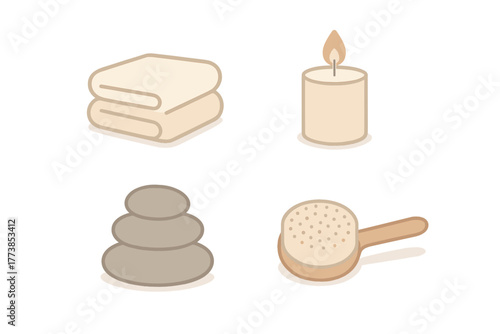 Stacked stones, folded towel, burning candle, and body brush for spa and wellness concepts