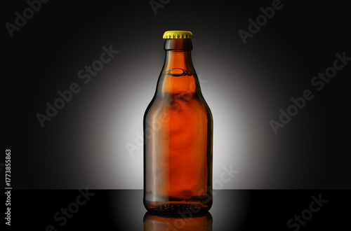 a small glass bottle of beer