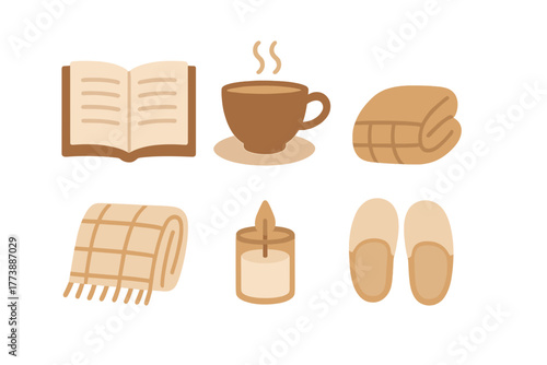 Cozy hygge essentials collection with book hot drink blanket candle and slippers