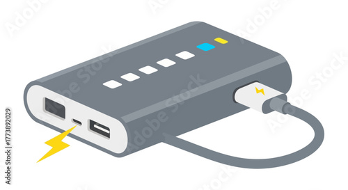 Isometric view of a gray rectangular device with a cable connected, charging with a yellow flash symbol. Status lights visible