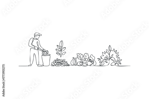 Gardener collecting plant clippings into a trash bin