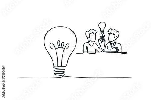 Two people collaborate on a new idea with a lightbulb