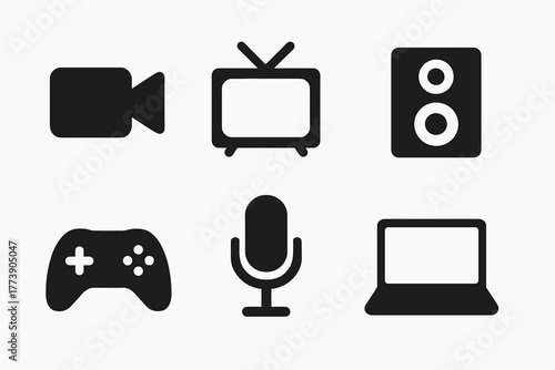 Technology icons set featuring game controller, microphone, and laptop