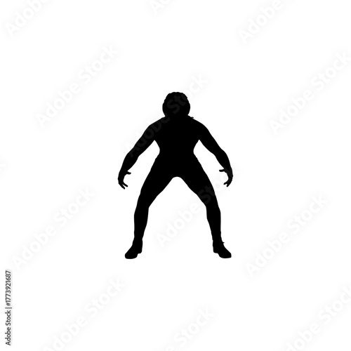 Silhouette of a powerful football player in a ready stance against a stark white background