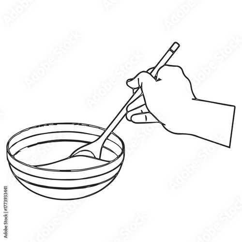 Hand stirring in a bowl