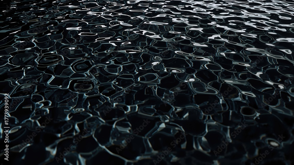 Obraz premium A close-up of water surface with ripples and reflections.
