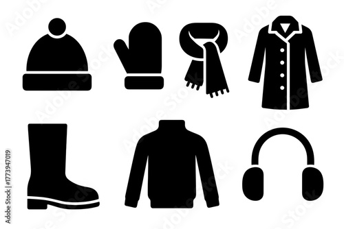 Collection of black winter clothing icons including a hat mitten scarf coat boot sweater and headphones on a white background in a flat design style representing cold weather apparel and accessories