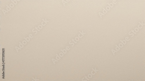 Plain beige wall texture background with no distinct features or objects.