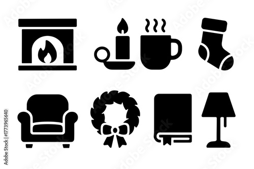 Collection of cozy Christmas icons including a fireplace candle mug stocking armchair wreath book and lamp in black silhouette isolated on white