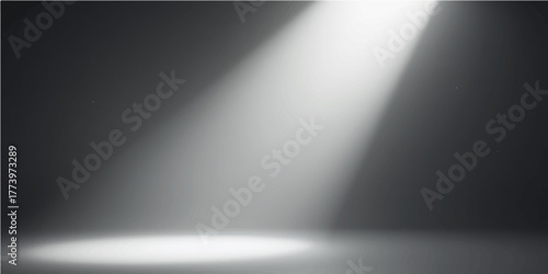 Spotlight on a brushed steel wall plate with a metallic pattern design