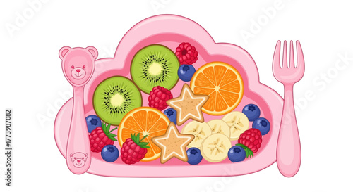 Colorful fruit platter on pink bear plate with fork and spoon for kids