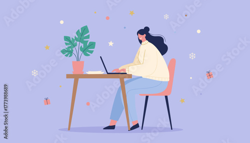 Happy woman working remotely on laptop at cozy desk surrounded by winter holiday elements