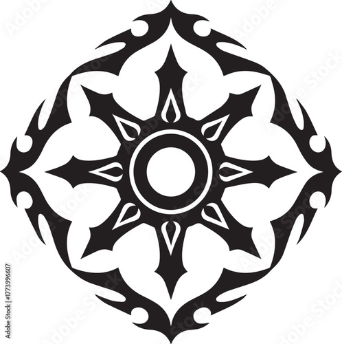 Symmetrical black artwork that appears as an intricate tribal sy