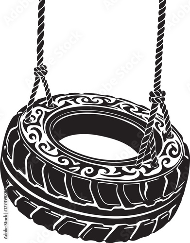 Monochrome tire swing with tribal pattern and rope, suspended in
