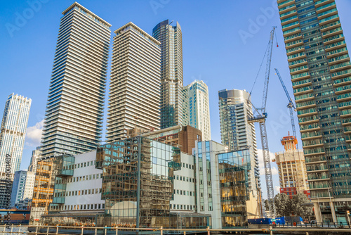 London, Canary Wharf,  South dock view at sunset. New residential development  

