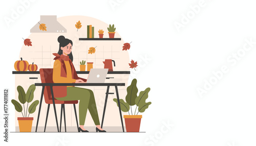 A frustrated woman works on a laptop at a kitchen counter reflecting the stress of working from home in autumn