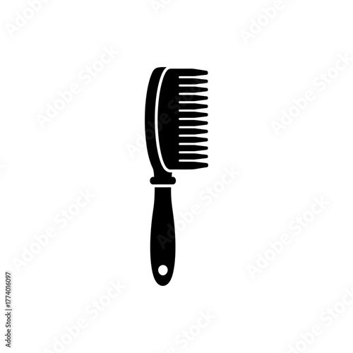 Black comb sits isolated on white surface, representing hair care and personal grooming in a minimalist style.